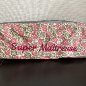Trousse « super maîtresse » rose